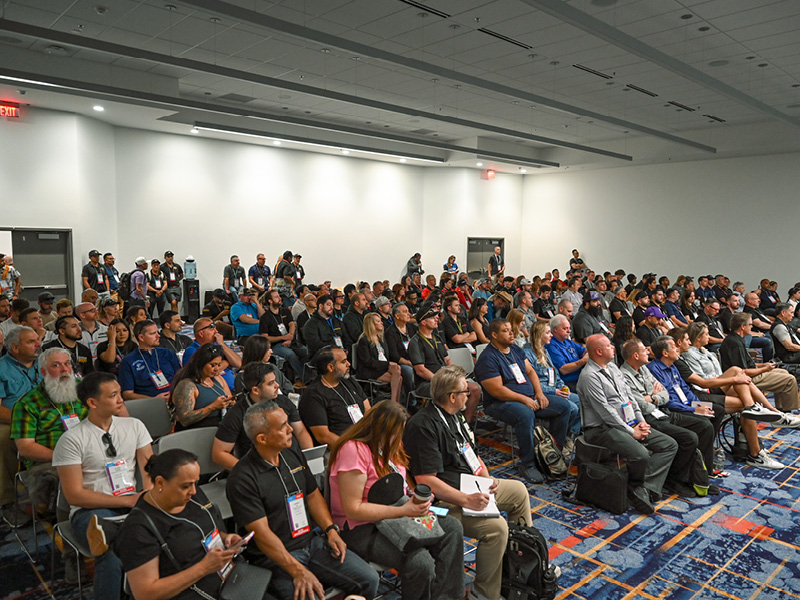 Full room of attendees at a SEMA Education session