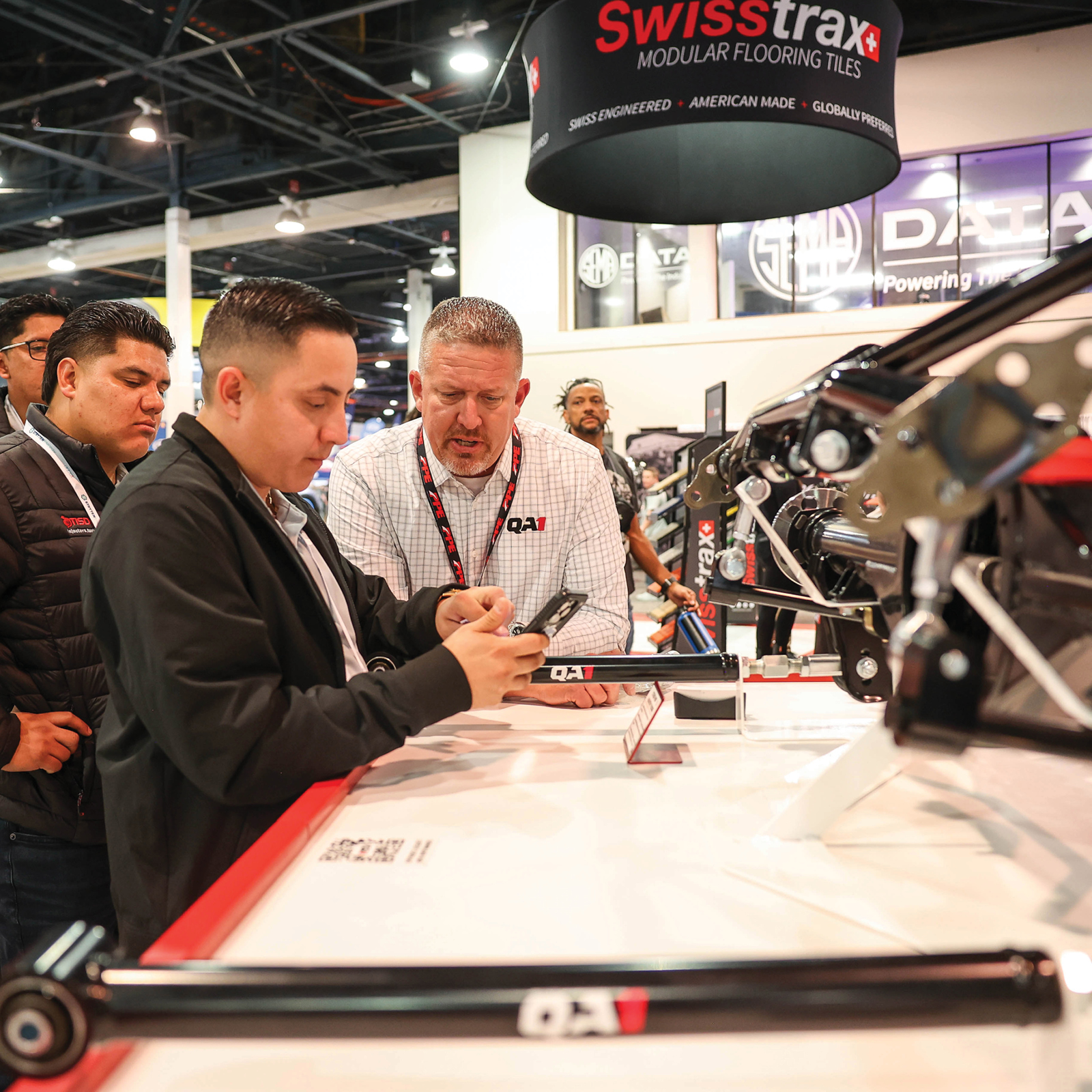 Industry professionals networking at SEMA
