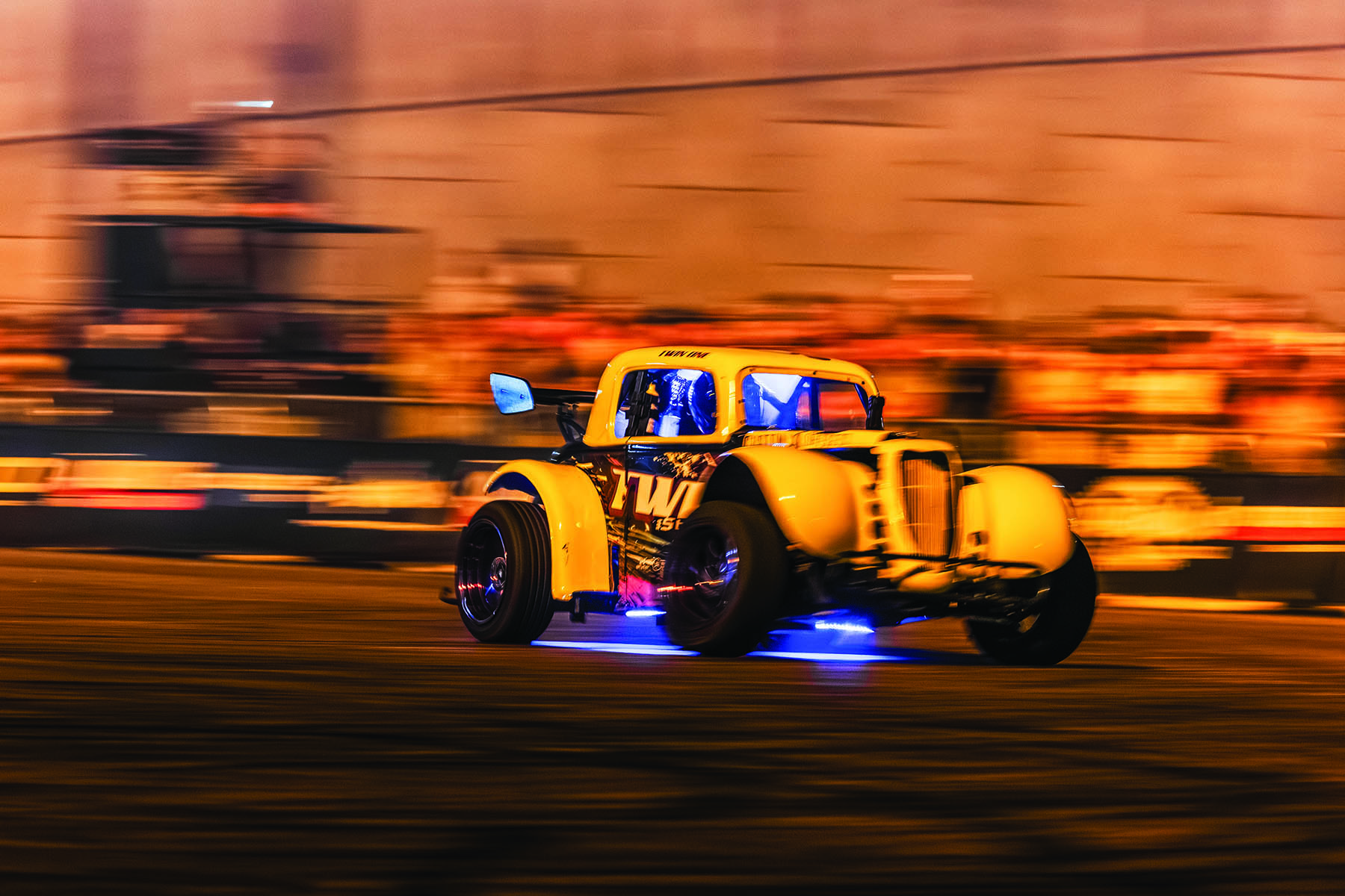 Hot rod with motion blurred background.