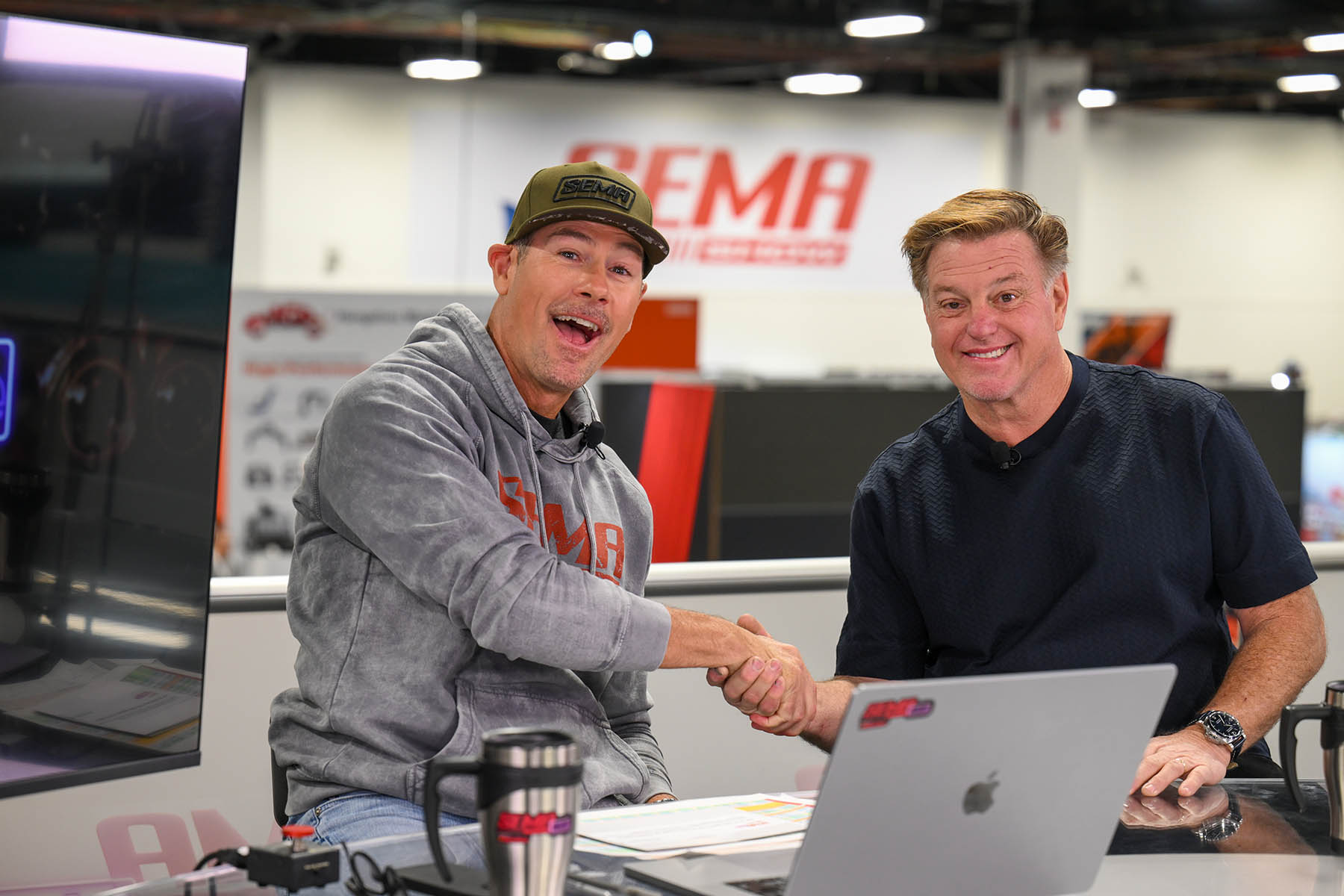 Chris Jacobs shaking hands with Chip Foose